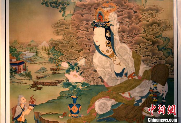 圖為5月16日，展覽中新創(chuàng)唐卡作品《靜息觀音》(局部)。　李林 攝